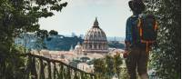 Pilgrim walking into St Peters in Rome at the end of the Via Francigena |  <i>Tim Charody</i>
