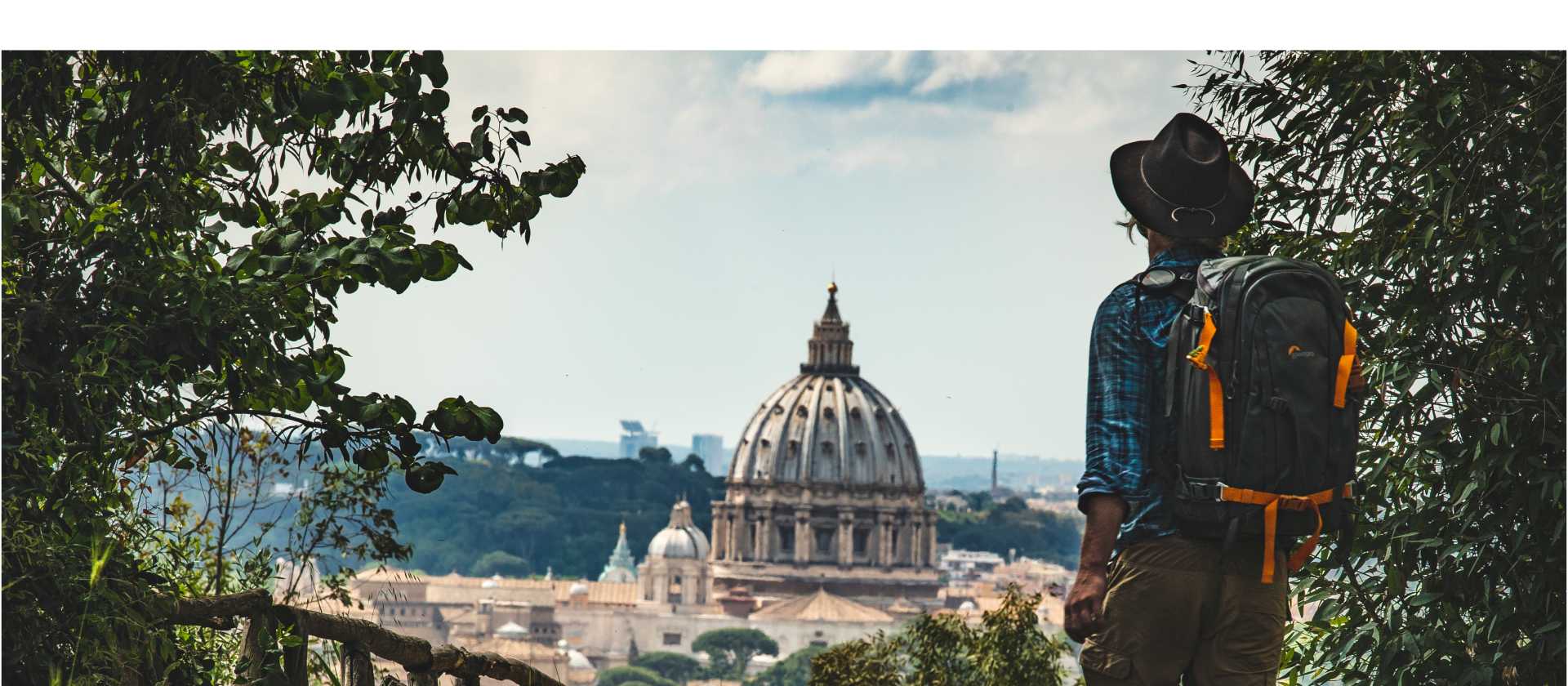 Pilgrim walking into St Peters in Rome at the end of the Via Francigena | Tim Charody