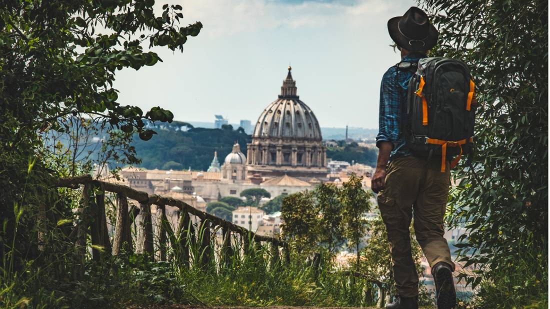 Pilgrim walking into St Peters in Rome at the end of the Via Francigena |  <i>Tim Charody</i>