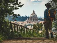 Pilgrim walking into St Peters in Rome at the end of the Via Francigena |  <i>Tim Charody</i>