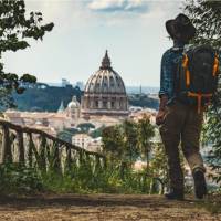 Pilgrim walking into St Peters in Rome at the end of the Via Francigena | Tim Charody