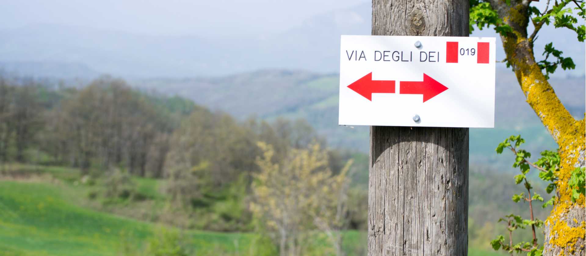 Sign along the Via Degli Dei trail in Italy