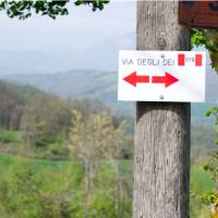 Sign along the Via Degli Dei trail in Italy