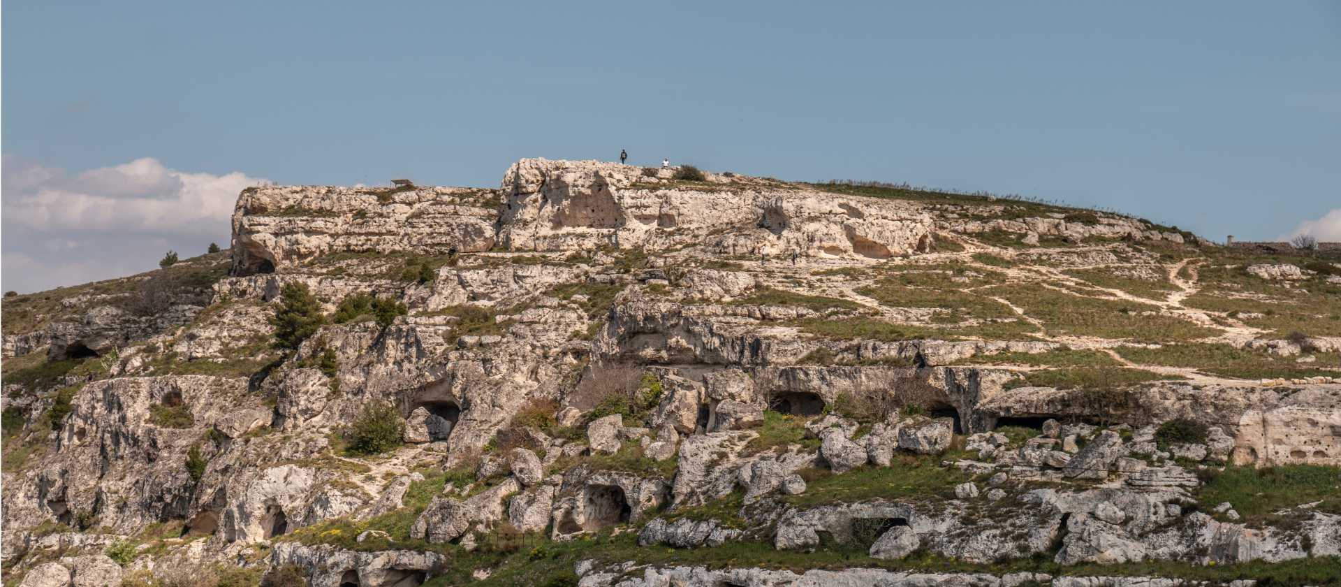 Explore cave houses, known as 'Sassi' in Matera, in Murgia National Park