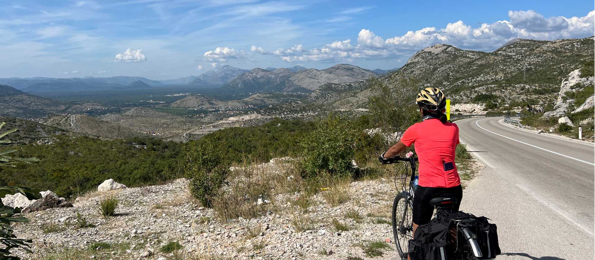 Cyclist taking in the view in Bosnia | Kate Baker
