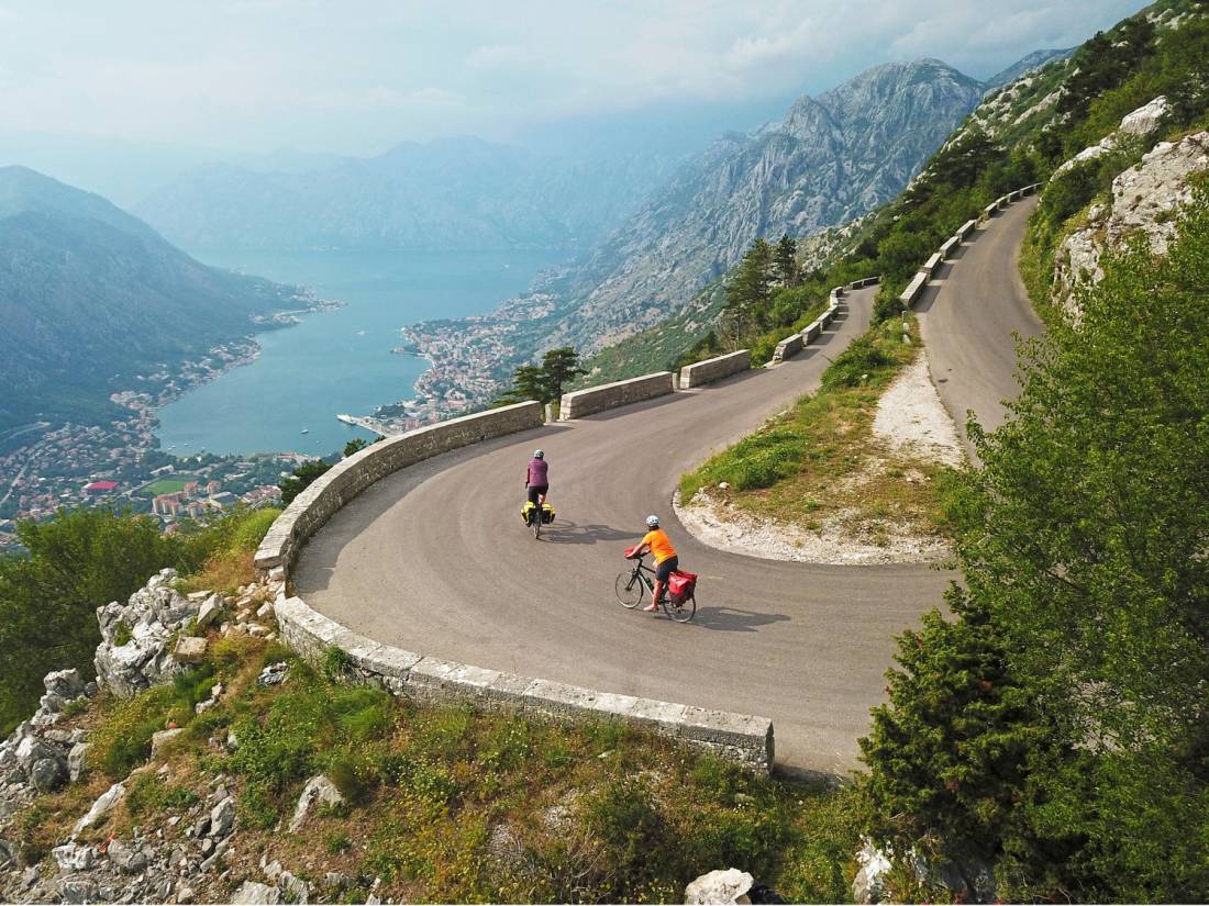 Cruising down the winding roads towards the Bay of Kotor on the Croatia to Albania Coastal Cycle