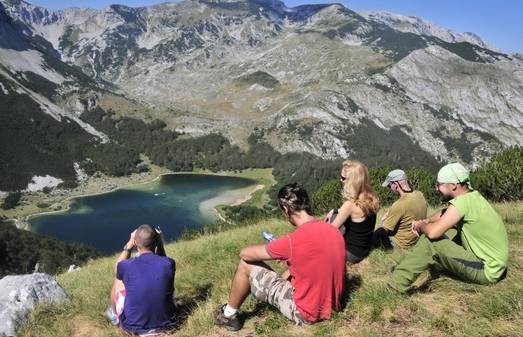 Enjoying the splendid view over Trnovacko Lake on the Via Dinarica walk