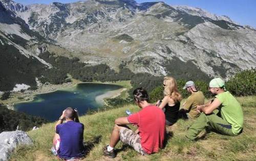 Enjoying the splendid view over Trnovacko Lake on the Via Dinarica walk