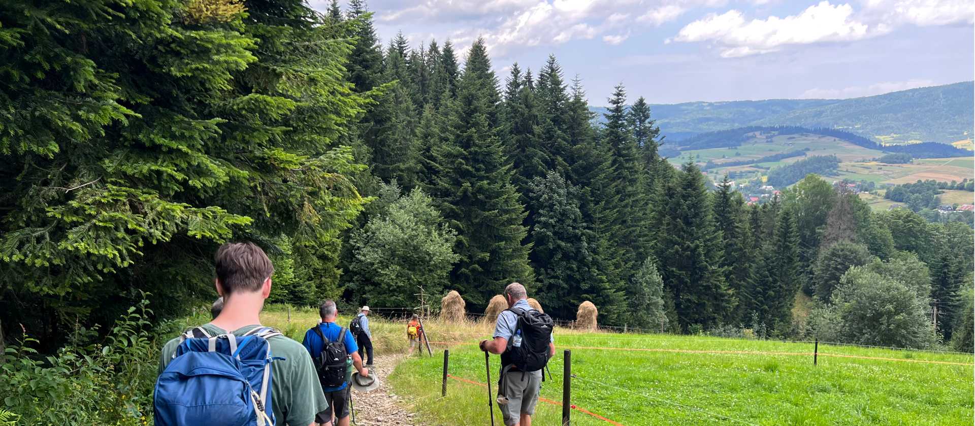Hikers descending from Mt Turbacz (1310 m) | Kate Baker