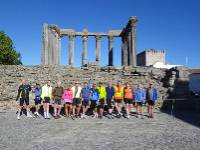 Cycle group in front of an ancient ruin in the Alentejo