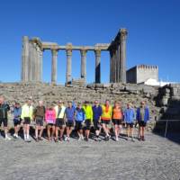 Cycle group in front of an ancient ruin in the Alentejo