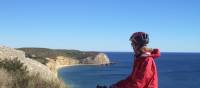 Cyclist admiring the coastline on day 5 of the Algarve Cycle