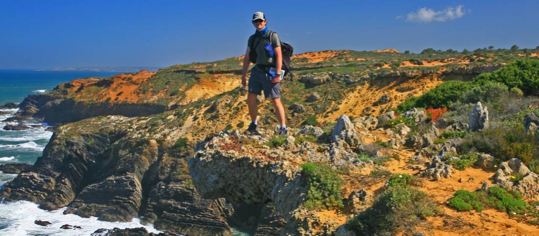 A walker overlooking the Atlantic Ocean on the Rota Vicentina in Portugal |  <i>John Millen</i>