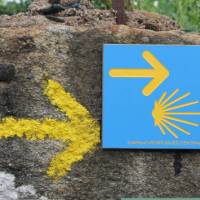 Portuguese Camino sign showing the way to Santiago de Compostela in Spain | Jaclyn Lofts