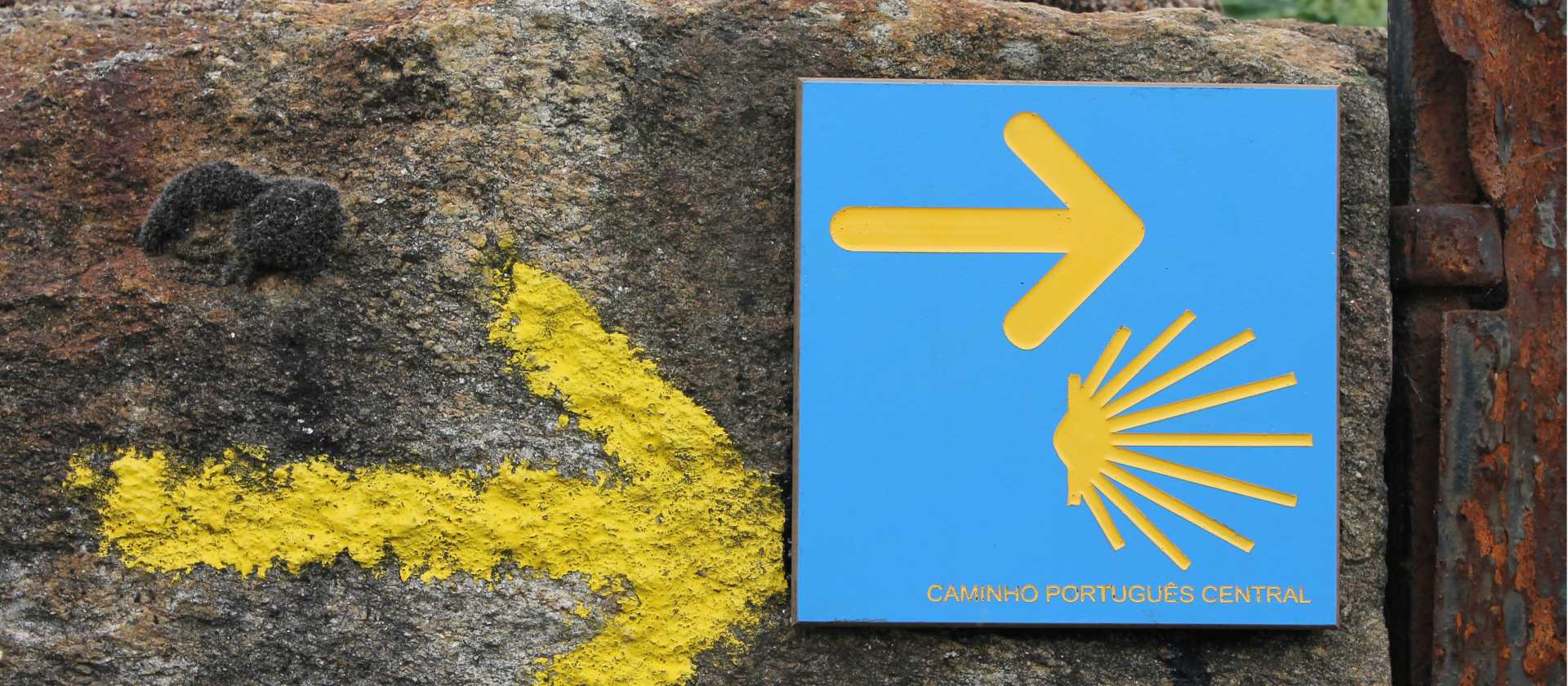 Portuguese Camino sign showing the way to Santiago de Compostela in Spain | Jaclyn Lofts
