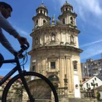 Cycling past the Church of the Pilgrim, Pontevedra | Pat Rochon