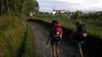 Pilgrims walking the Camino Portuguese.,José Antonio Gil Martínez Pilgrims walking the Camino Portuguese.