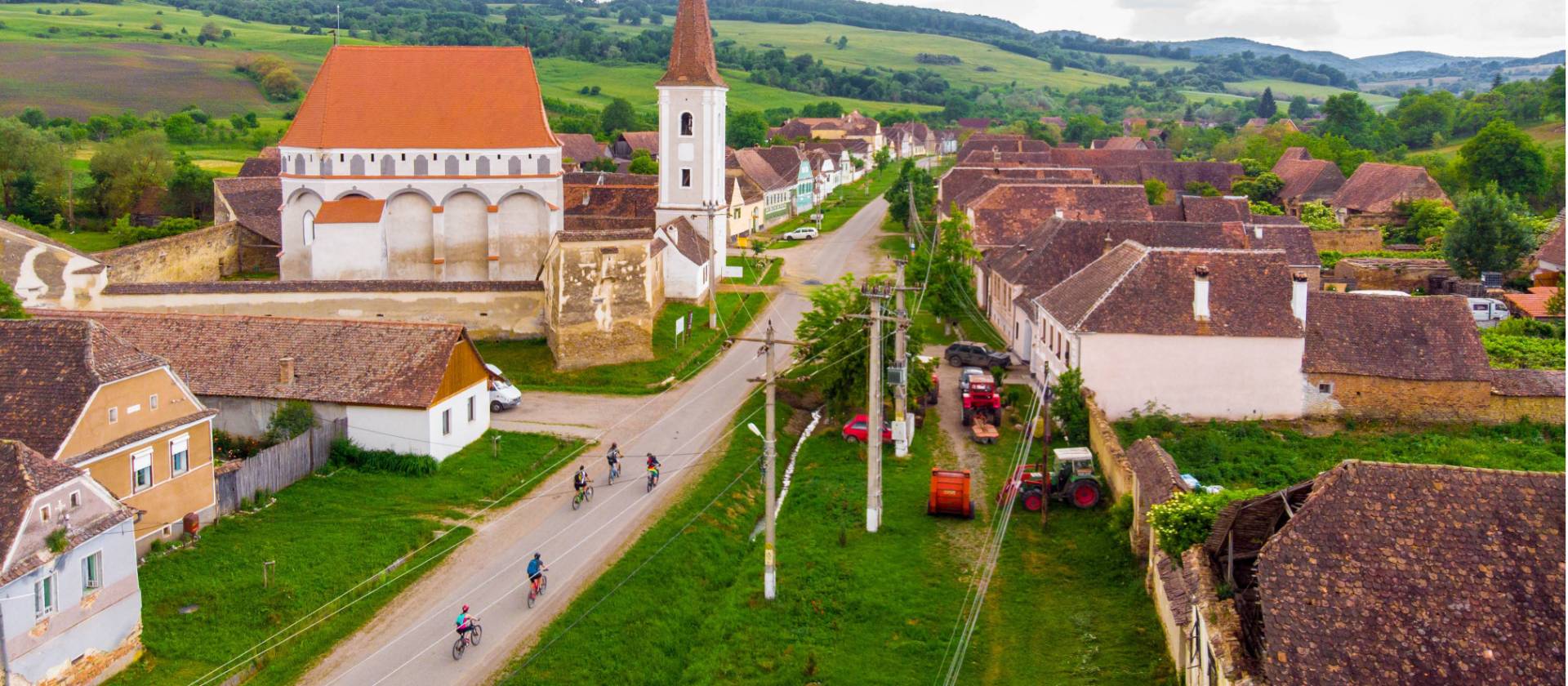 Cycling through a village in Transylvania