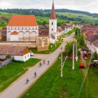 Cycling through a village in Transylvania
