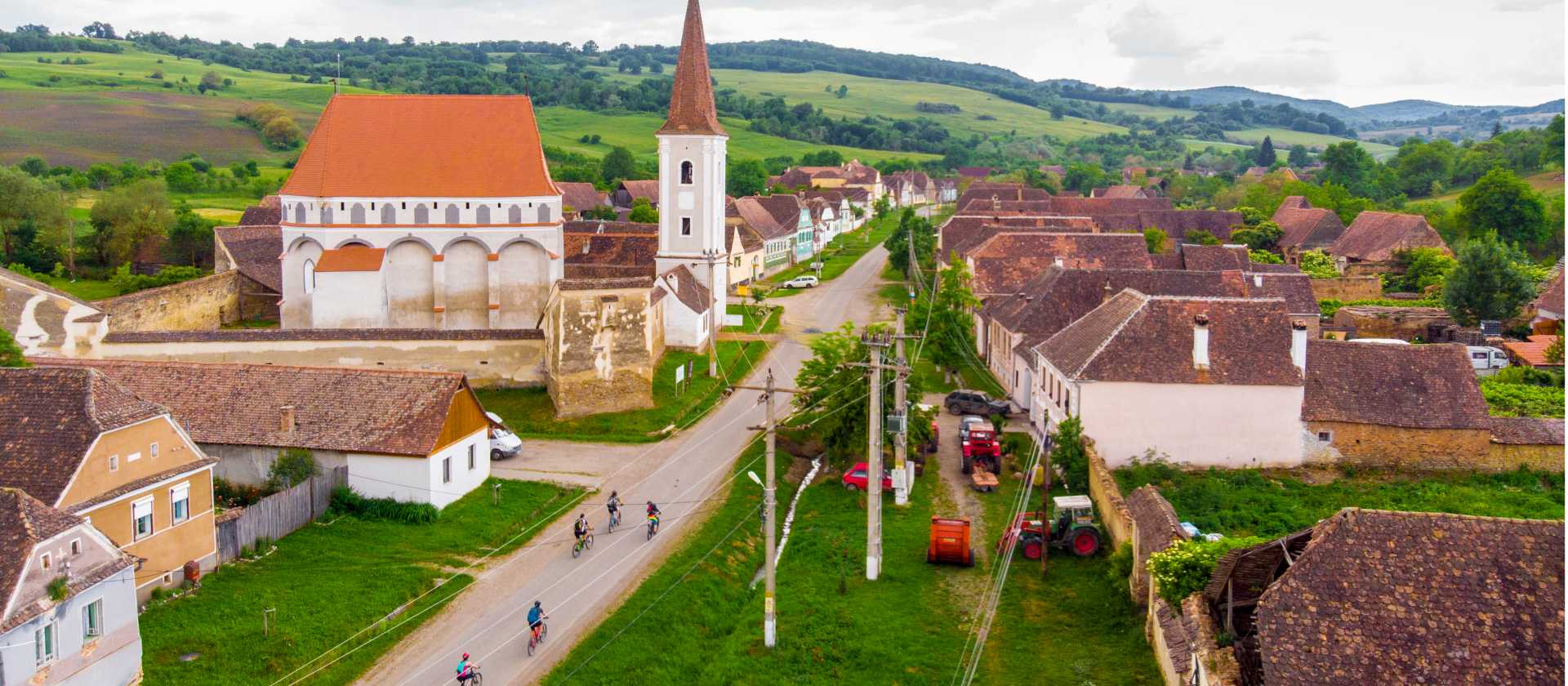 Cycling through a village in Transylvania