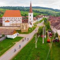 Cycling through a village in Transylvania