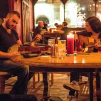 Traditional folk band playing music at a Scottish pub | Andrew Pickett