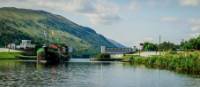 The Ros Crana barge leaving Loch Oich