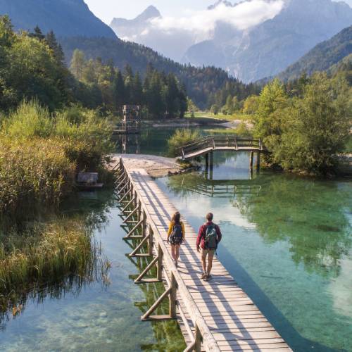 Walking over a picturesque bridge in Slovenia