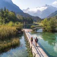 Walking over a picturesque bridge in Slovenia