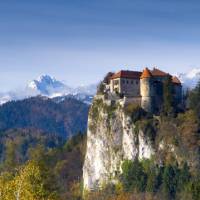 Bled Castle and Triglav in the background | Klemen Kunaver