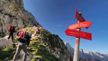 #F002354-13_Triglav_4102_orig.jpg-photo-l,Ana Pogacar Hiker ascending Mt Triglav, Slovenia's tallest mountain
