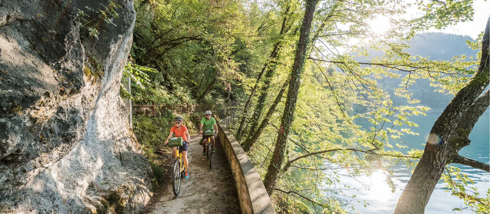 Cyclists lakeside in Slovenia