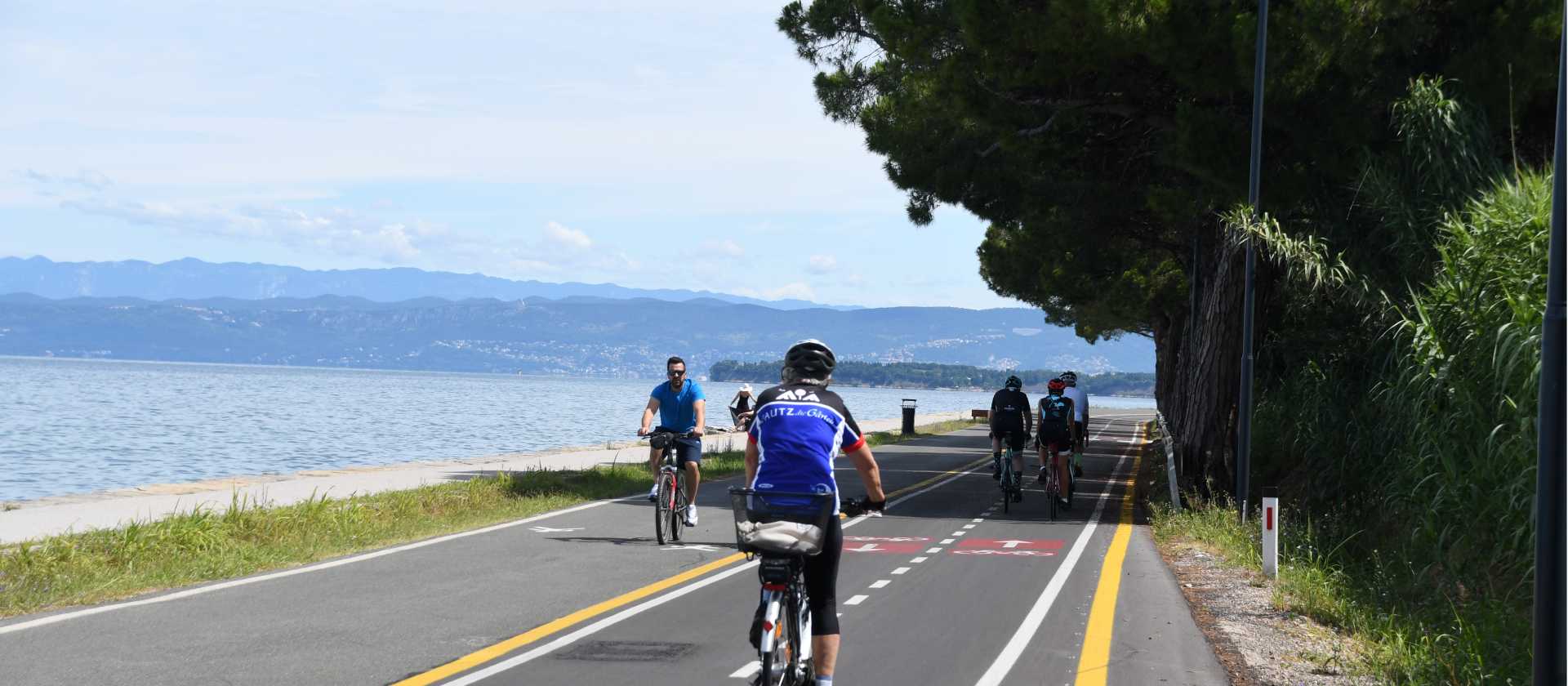 Cyclists on a dedicated cycle path on the Adriatic coast