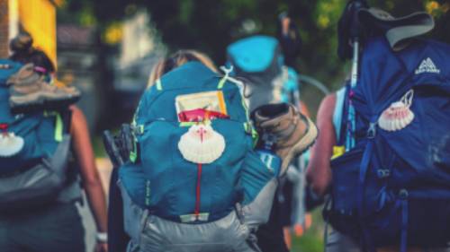 Pilgrims walking on the Camino in Spain | @timcharody