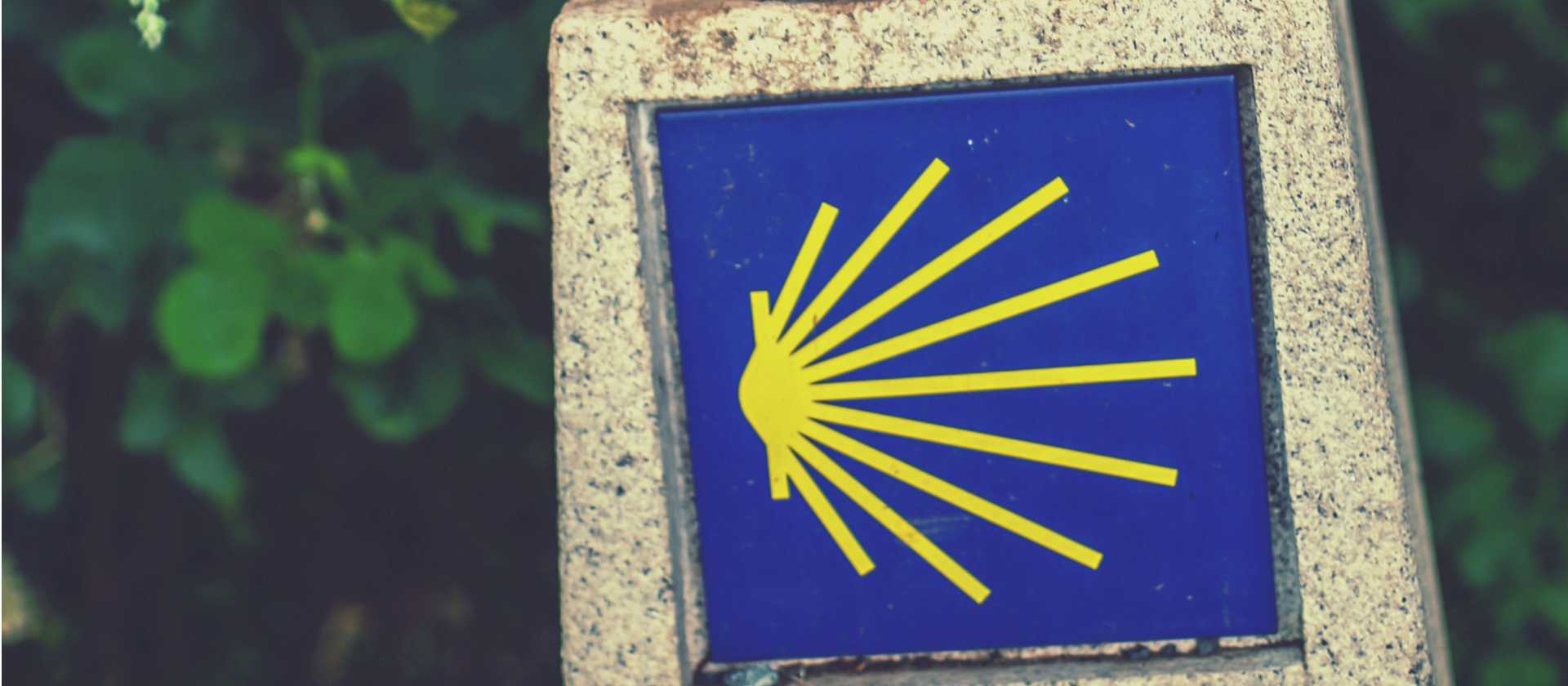 Decorative signage along the Camino | @timcharody