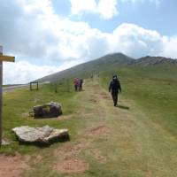 Pilgrim crossing a pass on the Camino de Santiago trail to Roncesvalles | Gesine Cheung