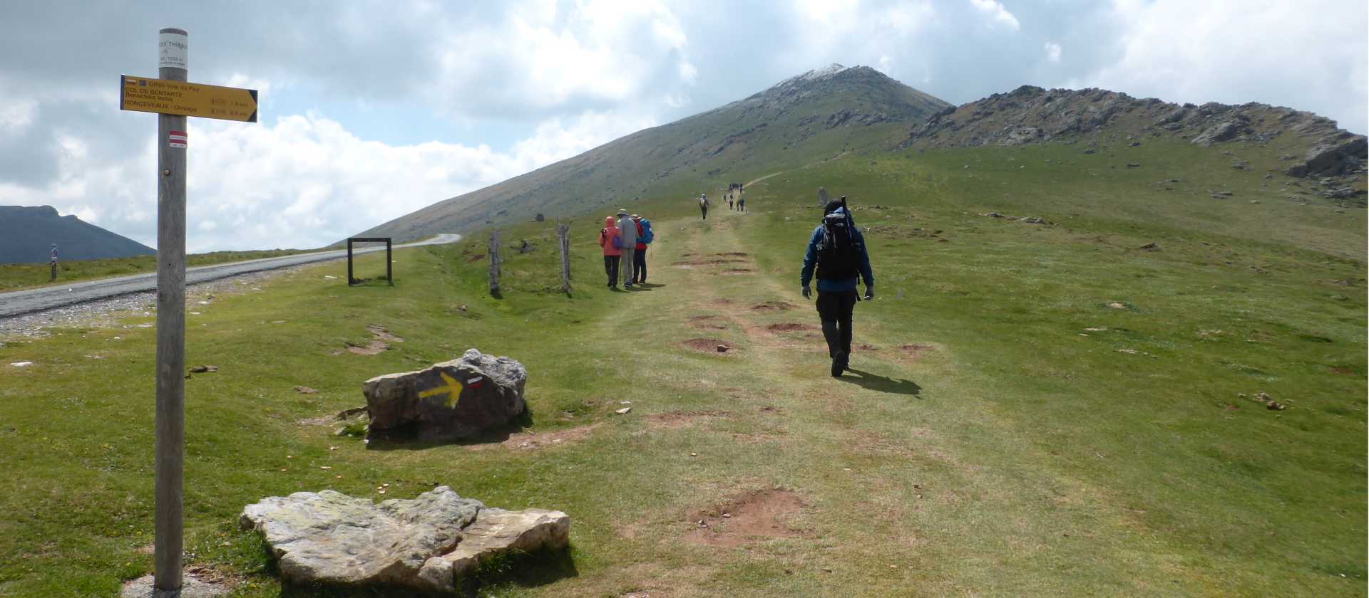 Pilgrim crossing a pass on the Camino de Santiago trail to Roncesvalles | Gesine Cheung