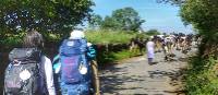 Pilgrims hiking through rural villages along the Camino Frances in Spain | Gesine Cheung