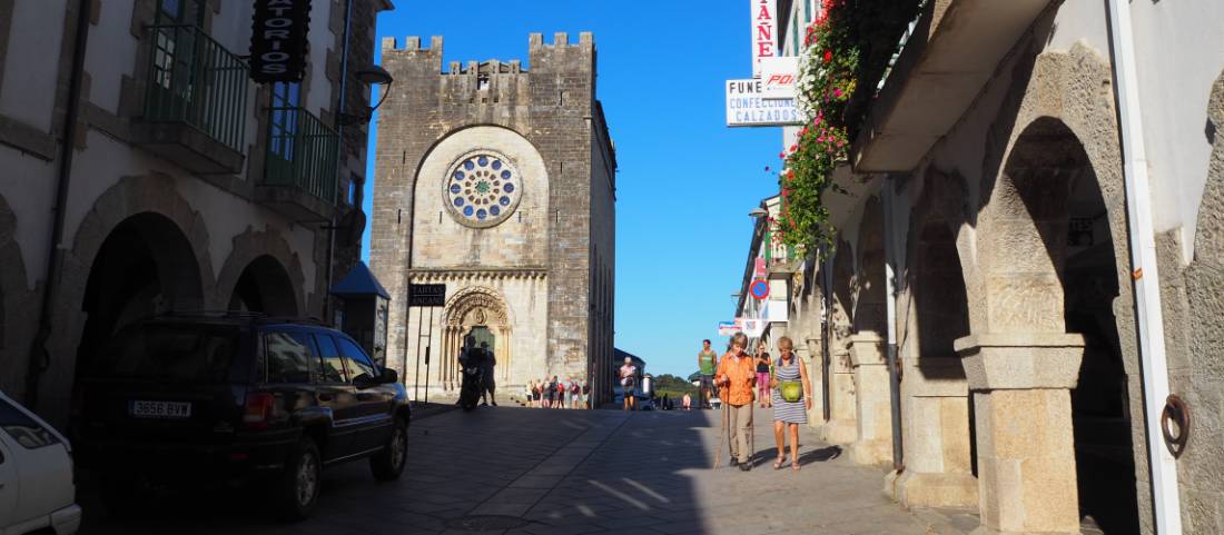 Pilgrims enjoy a stroll through Portomarin after a day walking on the Camino |  <i>Sue Finn</i>
