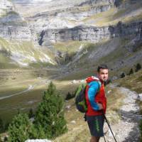 Hiker traversing the Ordesa Valley, Spanish Pyrenees