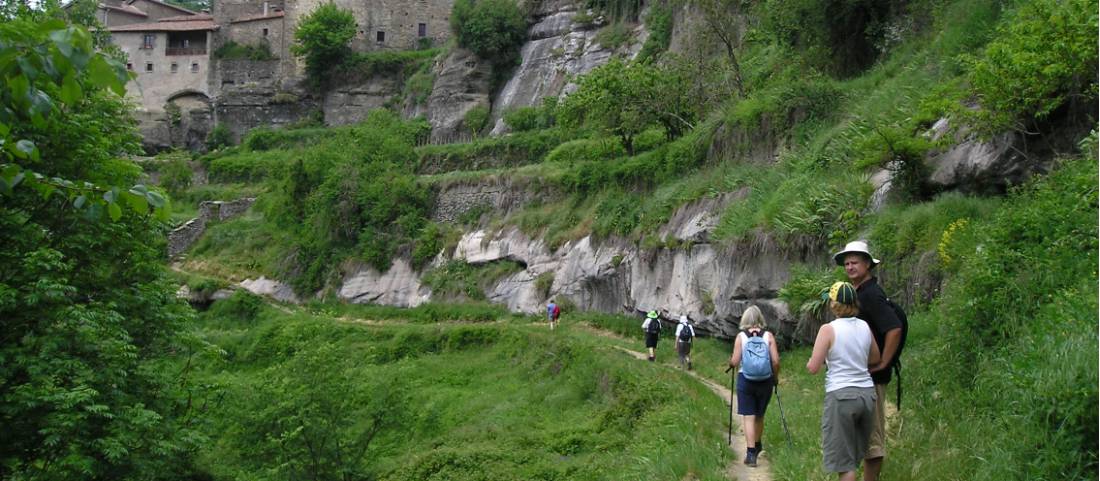 Hikers entering the delightful hilltop town of Rupit