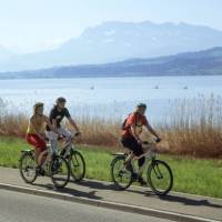 Cycling along the lake in middle Switzerland