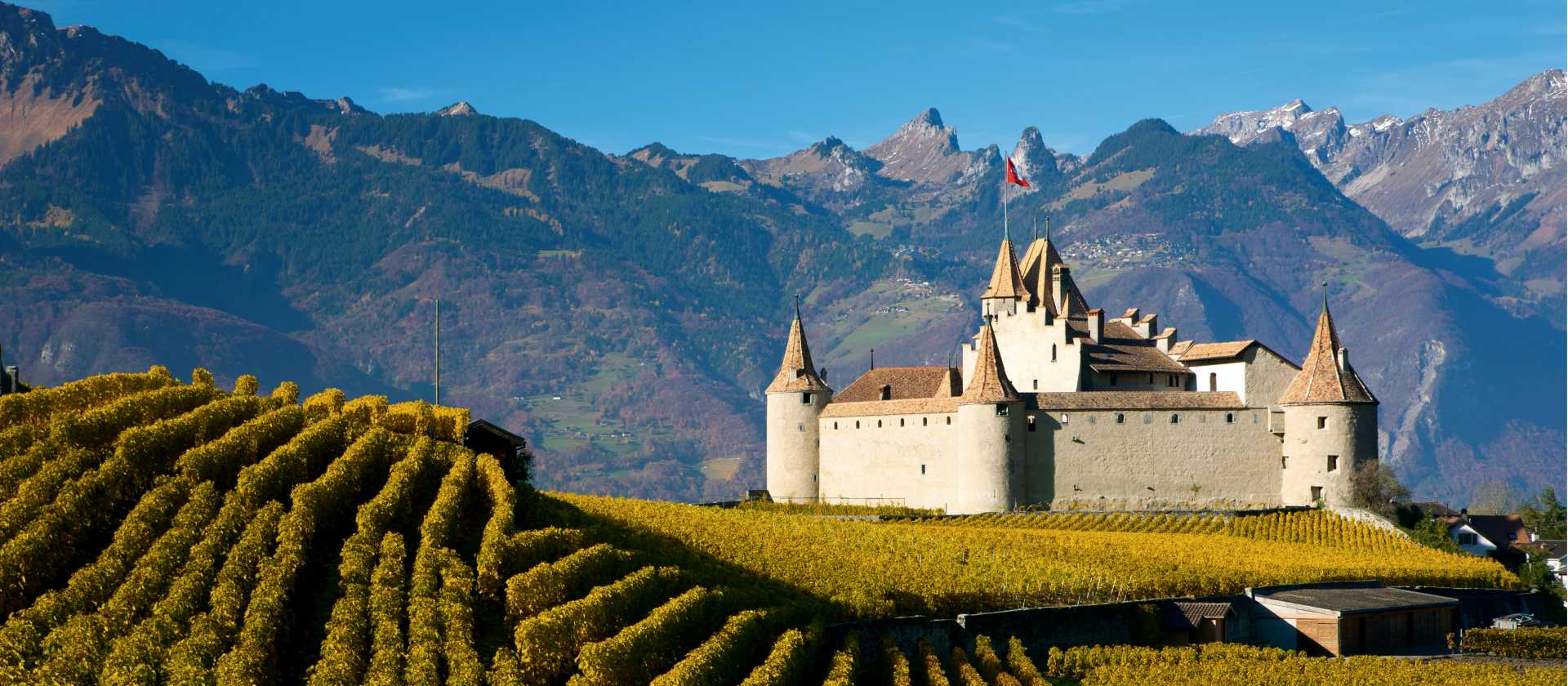 Stunning scenery and Aigle Castle along the Via Francigena in Switzerland