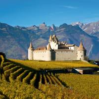 Stunning scenery and Aigle Castle along the Via Francigena in Switzerland