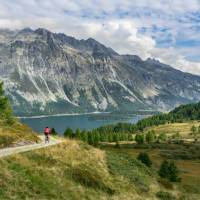 Pedalling towards a picturesque lake in Switzerland