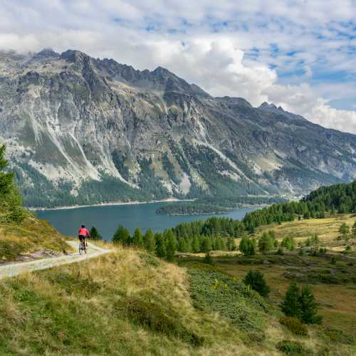 Pedalling towards a picturesque lake in Switzerland