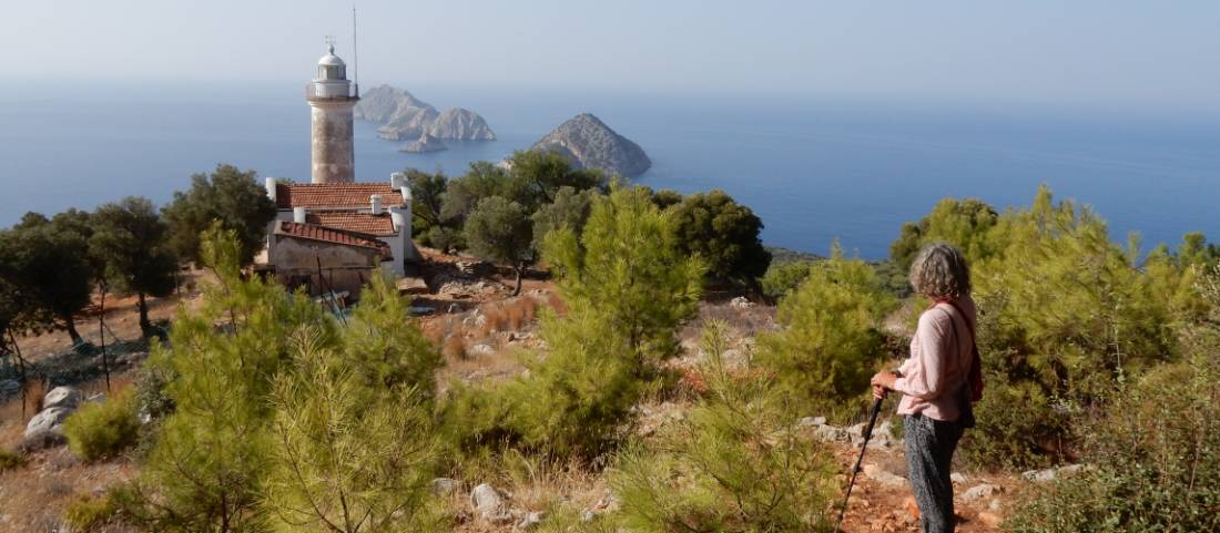 Hiker enjoying the view of Cape Gelidonia lighthouse and the 'Five Islands' |  <i>Lilly Donkers</i>