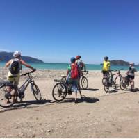 Pedalling along the empty stretches of Fethiye Beach in Turkey