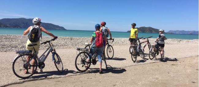 Pedalling along the empty stretches of Fethiye Beach in Turkey