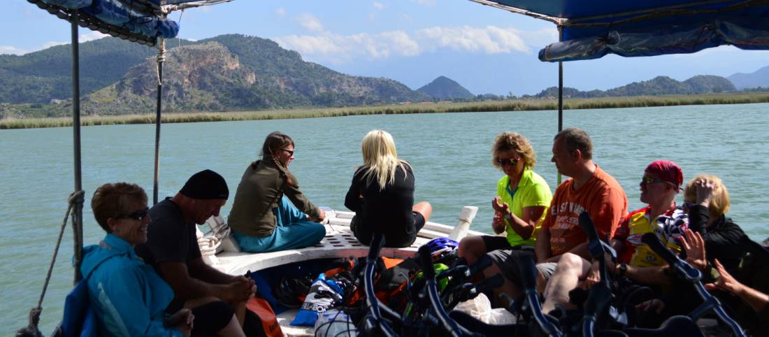 The bikes are loaded on to the small boat which takes the group to the Dalyan rock tombs |  <i>Erin Williams</i>